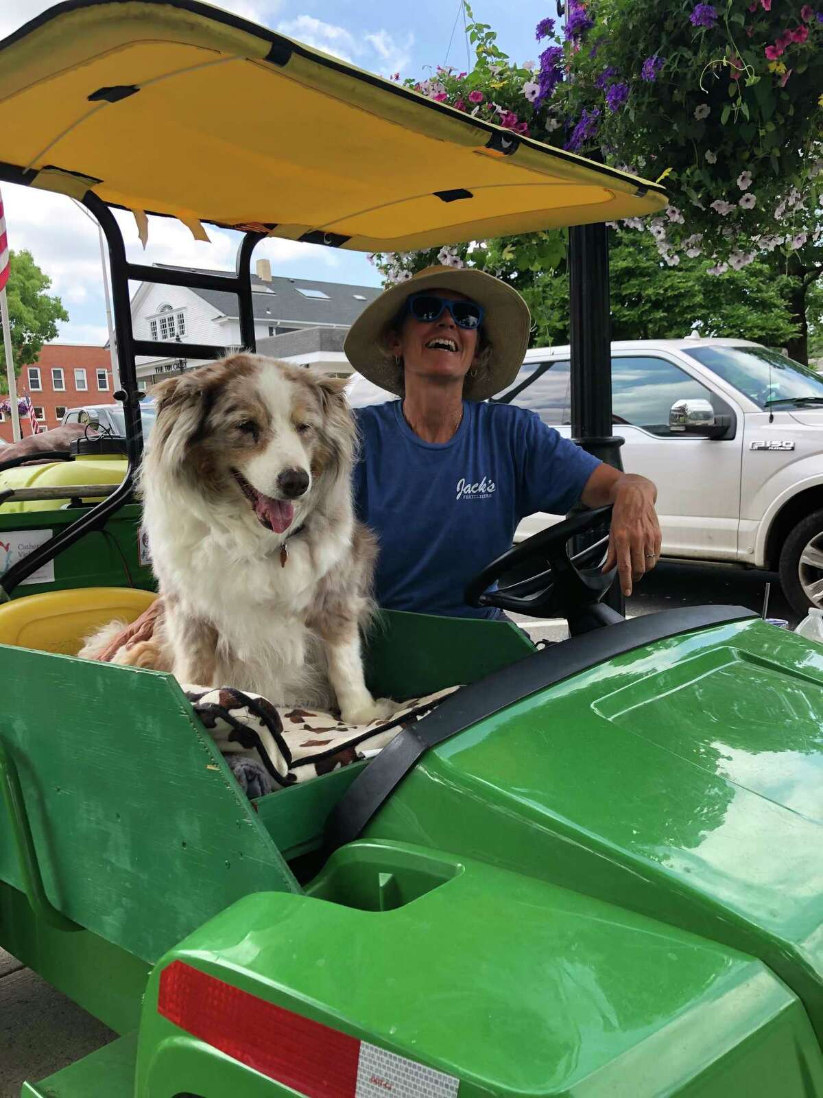 Biscuit with “the flower lady” Spencer Moore on the watering cart that the two rode around Ridgefield's village for years, caring for the baskets of hanging plants. “I will say that Biscuit taught me a lot during the countless hours we spent together caring for the baskets — value of patience, loyalty, generosity, acceptance, and savoring each day,” Moore said. “She did not require a lot but she certainly gave a lot. It will be big ‘paws’ to fill some day!” said Moore. With flower baskets not just in the village these days, but down on Route 35, Moore has human help with her watering duties.