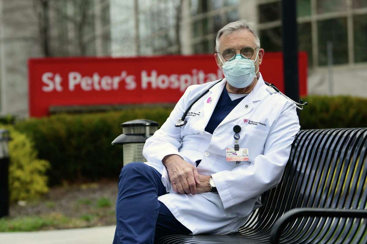 Dr. Jorge Cerda, chief of the Department of Medicine at St. Peter?•s Hospital, sits outside the hospital on Wednesday, Nov. 25, 2020 in Albany, N.Y. Dr. Cerda has been treating COVID-19 patients since the start of the pandemic. (Lori Van Buren/Times Union)