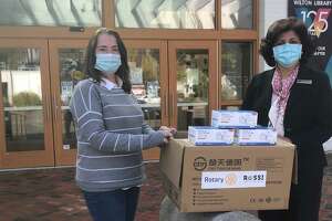 Rotary donates 1,700 face masks to Wilton Library - Photo