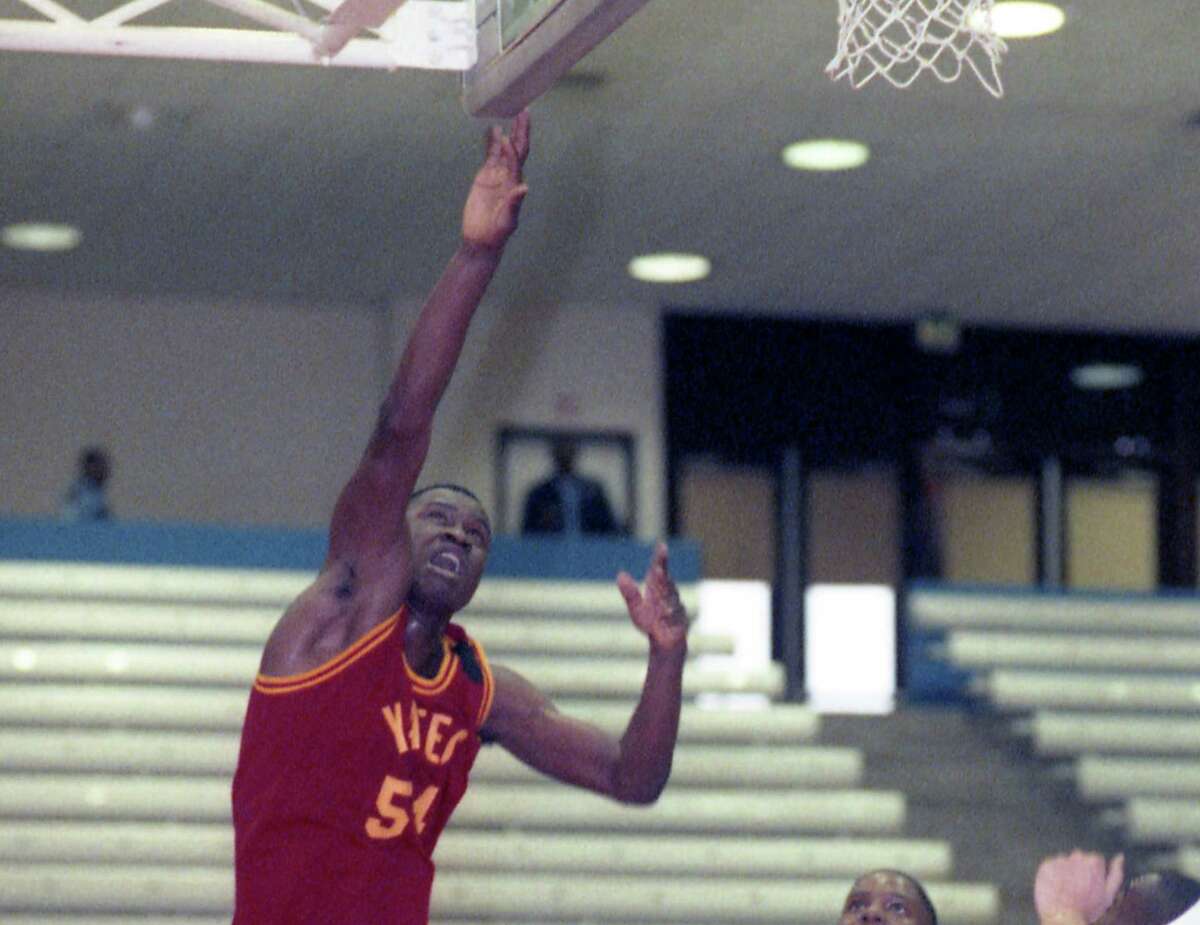 George Floyd, who played football and basketball during his days at Yates High School, puts up a shot in a 1992 game at Barnett Field House.
