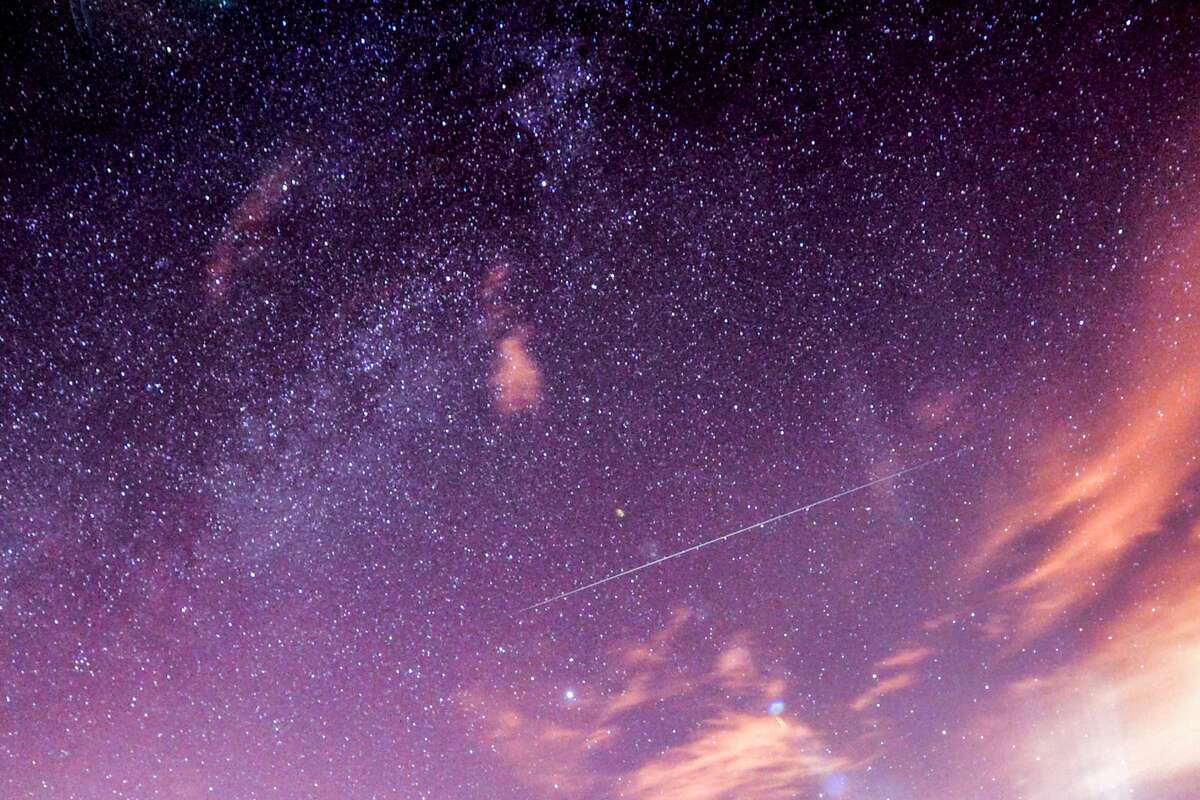 A brilliant Geminid meteor shower is expected to illuminate the night skies in mid-December. Skywatchers will have another rare visual feast with a "double planet" sighting on Dec. 21.
