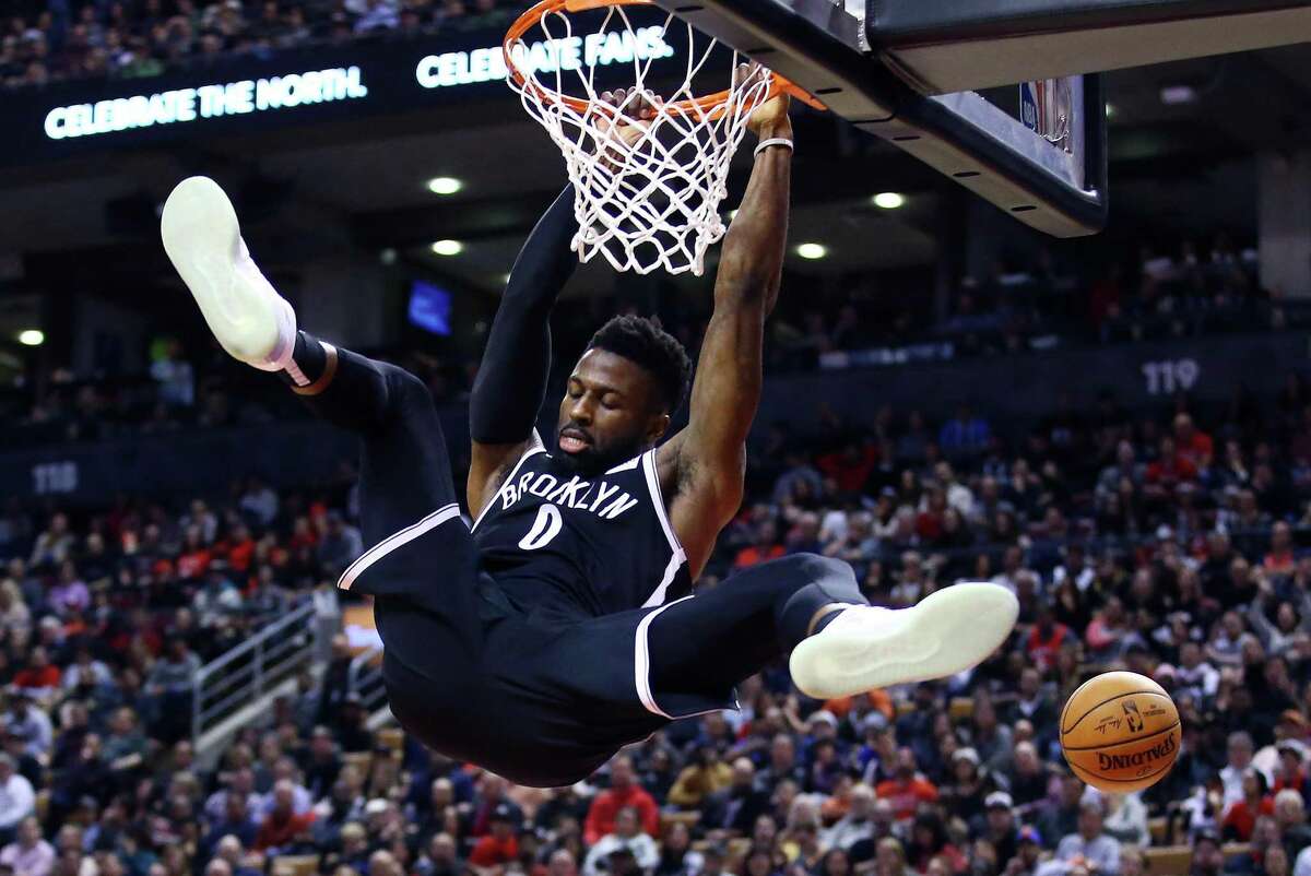 David Nwaba, finishing a dunk last year for the Nets, says he is healthy and ready to contribute to the Rockets after missing 11 months with an Achilles injury.