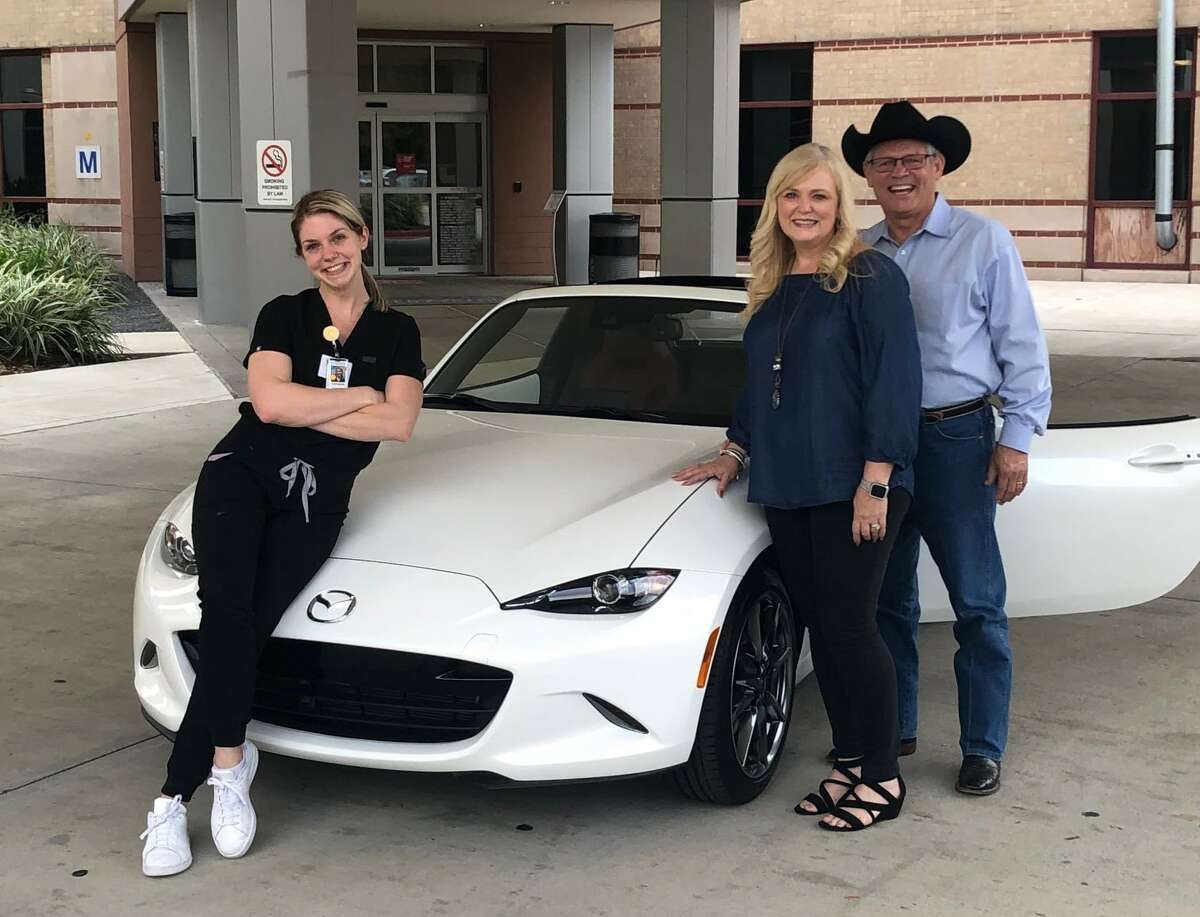 Christie Purviance, a Houston ICU nurse, was honored for going above and beyond to help COVID-19 patients with the gift of a new car.