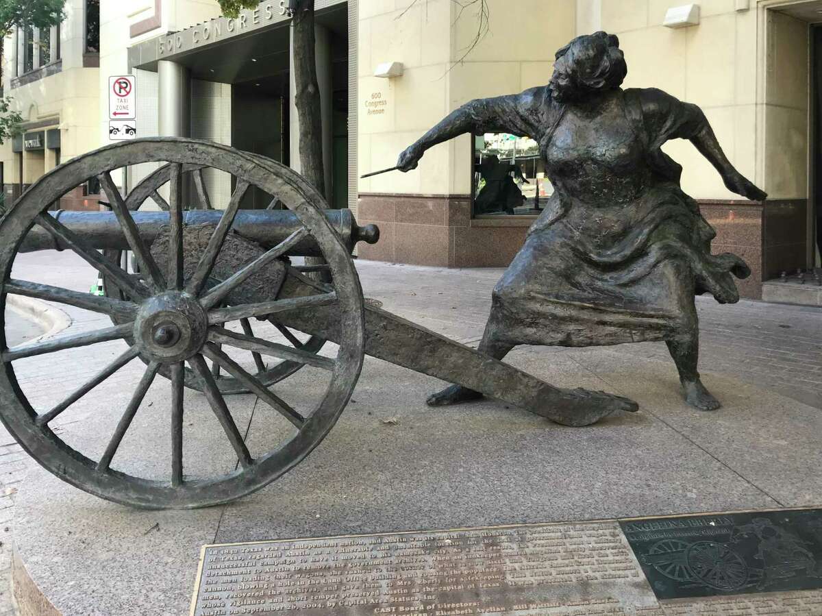 A bronze statue depicts innkeeper Angelina Belle Peyton Eberly across Congress Avenue in Austin.