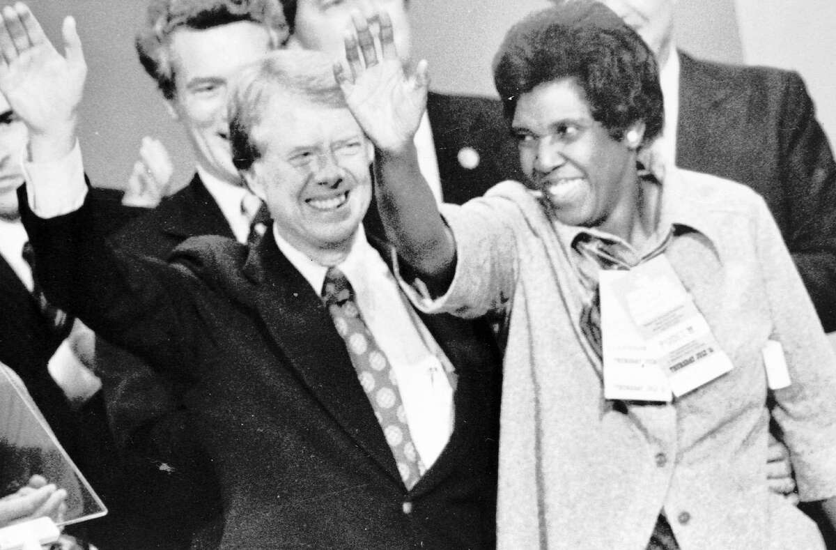 Representative Barbara Jordan, D-Texas, joins Democratic persidential nominee Jimmy Carter at the podium after Carter’s acceptance speech at the Democratic National Convention in New York City in1976. Jordan’s convention speech was so remarkable, it quickly spawned rumors she might be the vice presidential nominee. Jordan, whose ringing voice and unshakable faith in the Constitution inspired the nation during the Watergate impeachment hearings, died Jan. 17, 1996. She was 59.