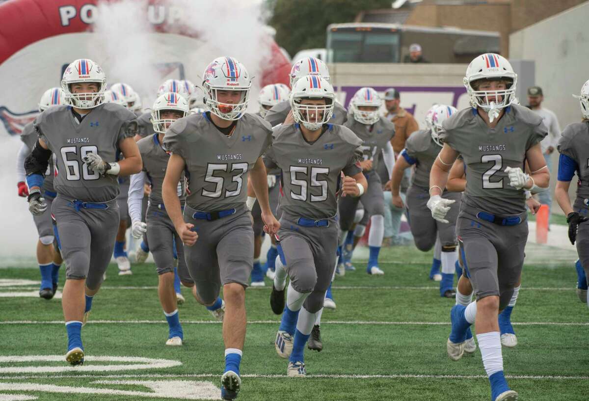 Midland Christian come out on to Anthony Field on Abilene Christian University campus for its TAPPS Division I state semifinal game against Dallas Parish Episcopal on 12/05/2020. Tim Fischer/Reporter-Telegram