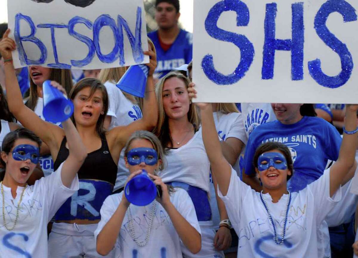 High school football - Shaker High fans cheer for their team as they take on Colonie on Thursday night. (Cindy Schultz / Times Union)