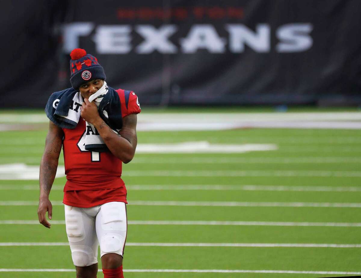 Houston Texans quarterback Deshaun Watson (4) reacts as he walked back to the locker room after he fumbled the ball for a turnover with minutes to go in the game after an NFL football game at NRG Stadium, Sunday, December 6, 2020, in Houston.