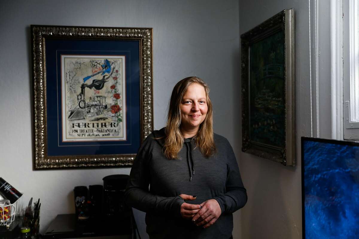 Jenn Oakley, who was previously homeless, stands for a portrait in her new studio apartment on Tuesday, Dec. 1, 2020 in Berkeley, California.This is the first time she�s had a place of her own in twelve years.