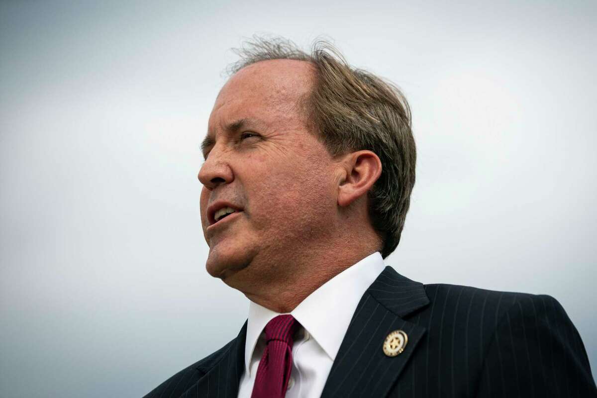 FILE -- Ken Paxton, the Texas attorney general, holds a news conference outside the Supreme Court building in Washington, Sept. 9, 2019. An architect of Texas Republicans’ aggressive conservative agenda, Paxton now stands accused of wrongdoing by his own aides and faces calls for his resignation. (Al Drago/The New York Times)