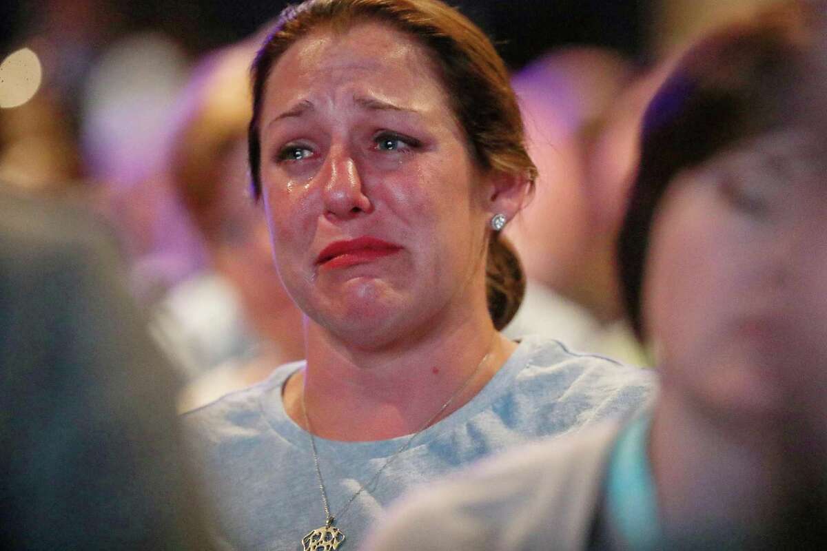 Jules Woodson cries as she listens to a panel discussion about sexual abuse and Southern Baptist churches, on the eve of the SBC's annual meeting on Monday, June 10, 2019, in Birmingham.
