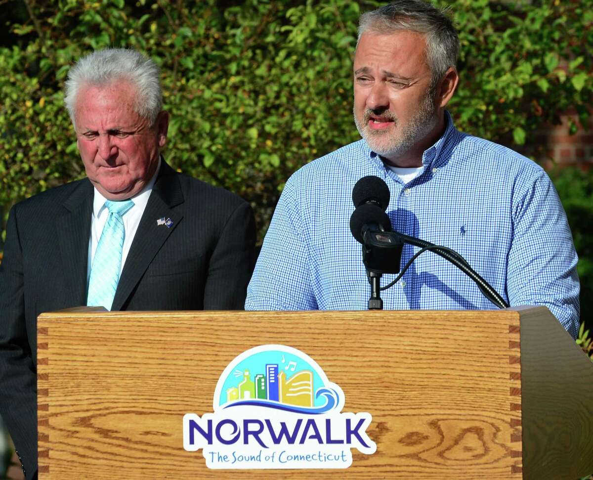 Norwalk Common Council member John Kydes alongside Mayor Harry Rilling on September 11, 2019, in Norwalk, Conn.