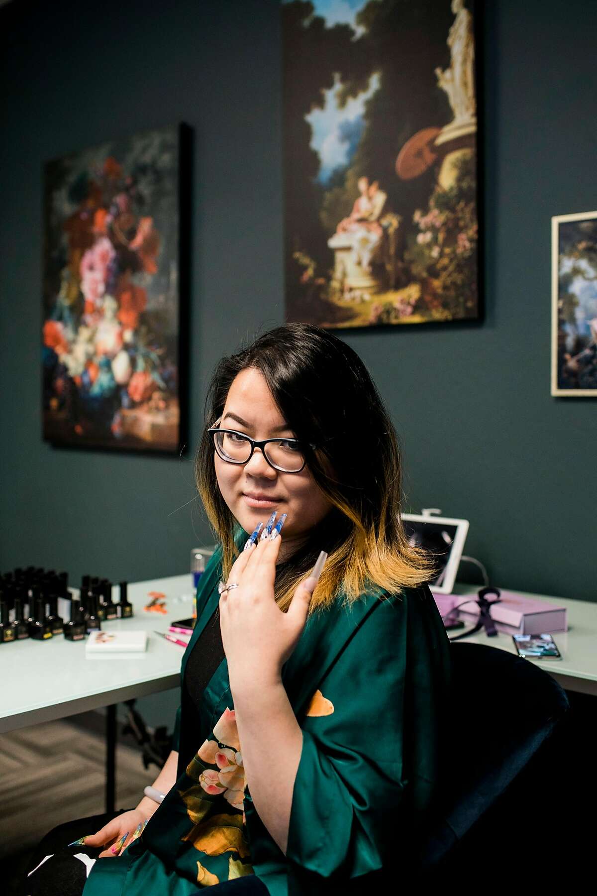 Pamper founder Vivian Xue Rahey, 29, at her office in Fremont, Calif. Pamper was a brick and mortar nail salon, but the pandemic forced it online, where it now sells hand-painted, press-on nail sets.