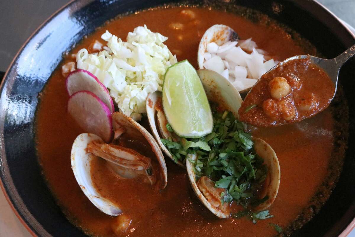 "Pozole rojo is an interior Mexican dish and the way my family made it when I was growing up," Ortega said. "We often served it with pork, beef or chicken. "We adapted to make our seafood and shellfish pozole to honor the rich cultures of the shores throughout Mexico. When we make Pozole de Puerco we use the head of the pig because it imparts a lot of flavor."  
