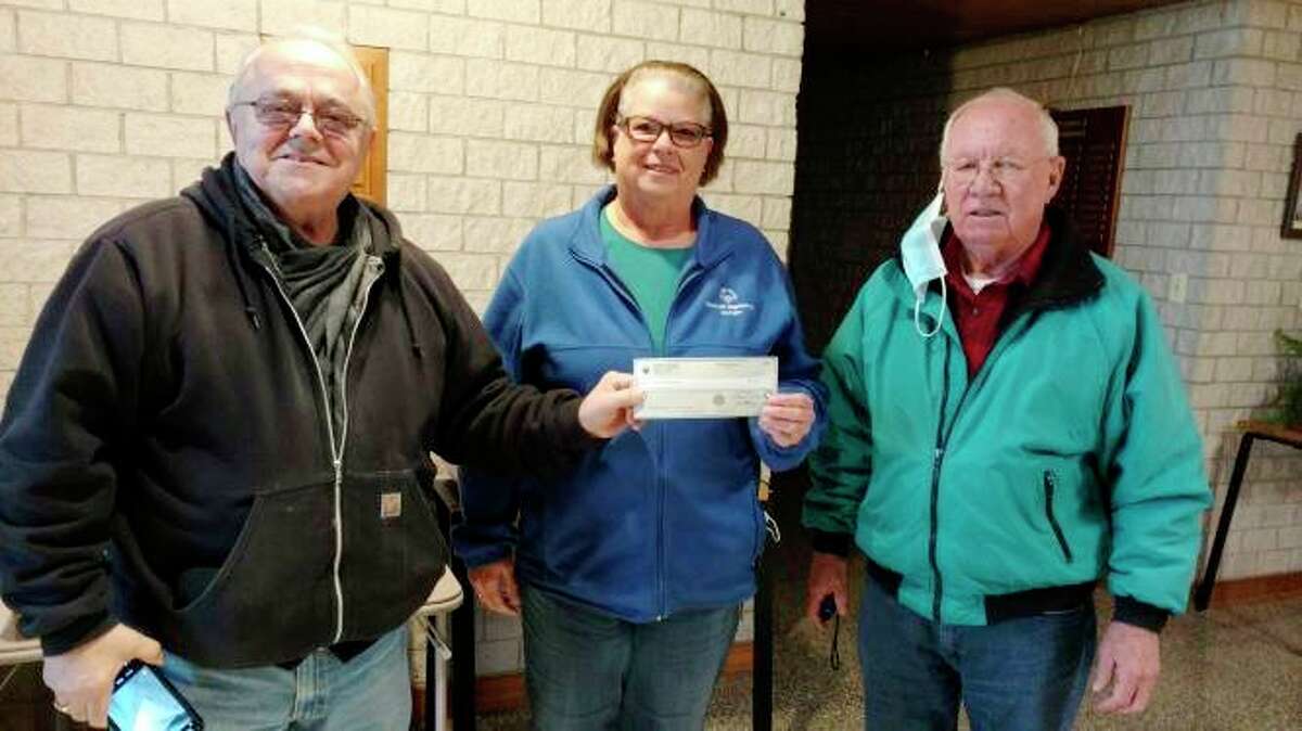Monsignor Victor Gallagher Council #12668, St. Philip Neri Catholic Church in Reed City, recently presented a check in the amount of $684. From left is Richard Hurst, Pat Rosales, Area 5 Director, and Richard Karns, Grand Knight. (Courtesy photo)