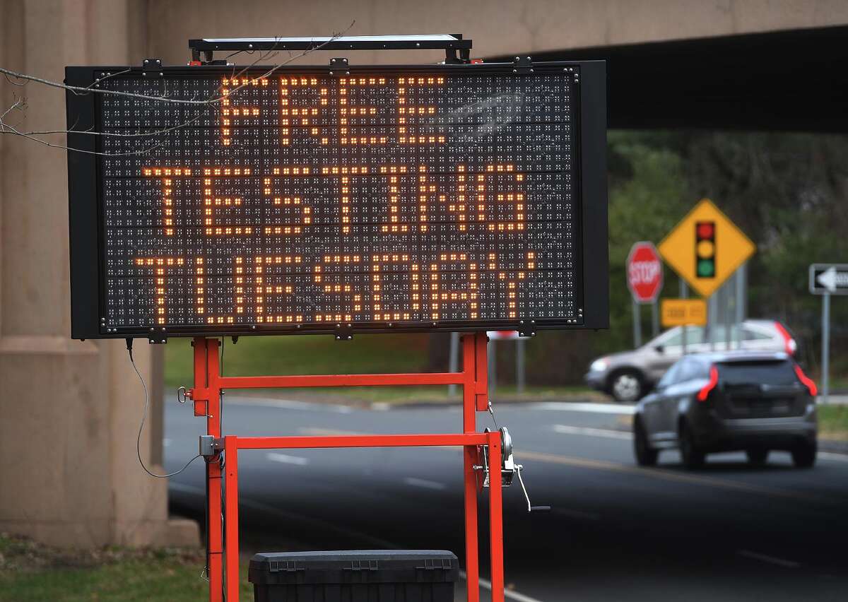 A sign advertises Griffin Hospital's new drive through testing site at Unity Park in Trumbull, Conn. on Tuesday, December 8, 2020. Testing will be available each Tuesday at the site from 9:30 am to 3 pm.
