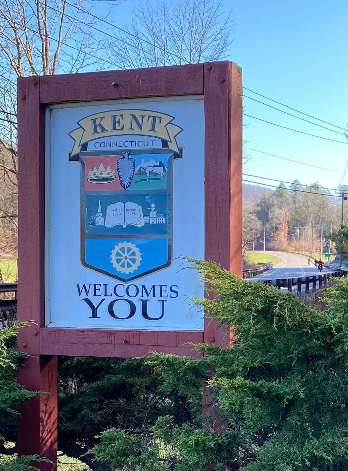 At right, a welcome sign along Macedonia Road and Schaghticoke Road in Kent.