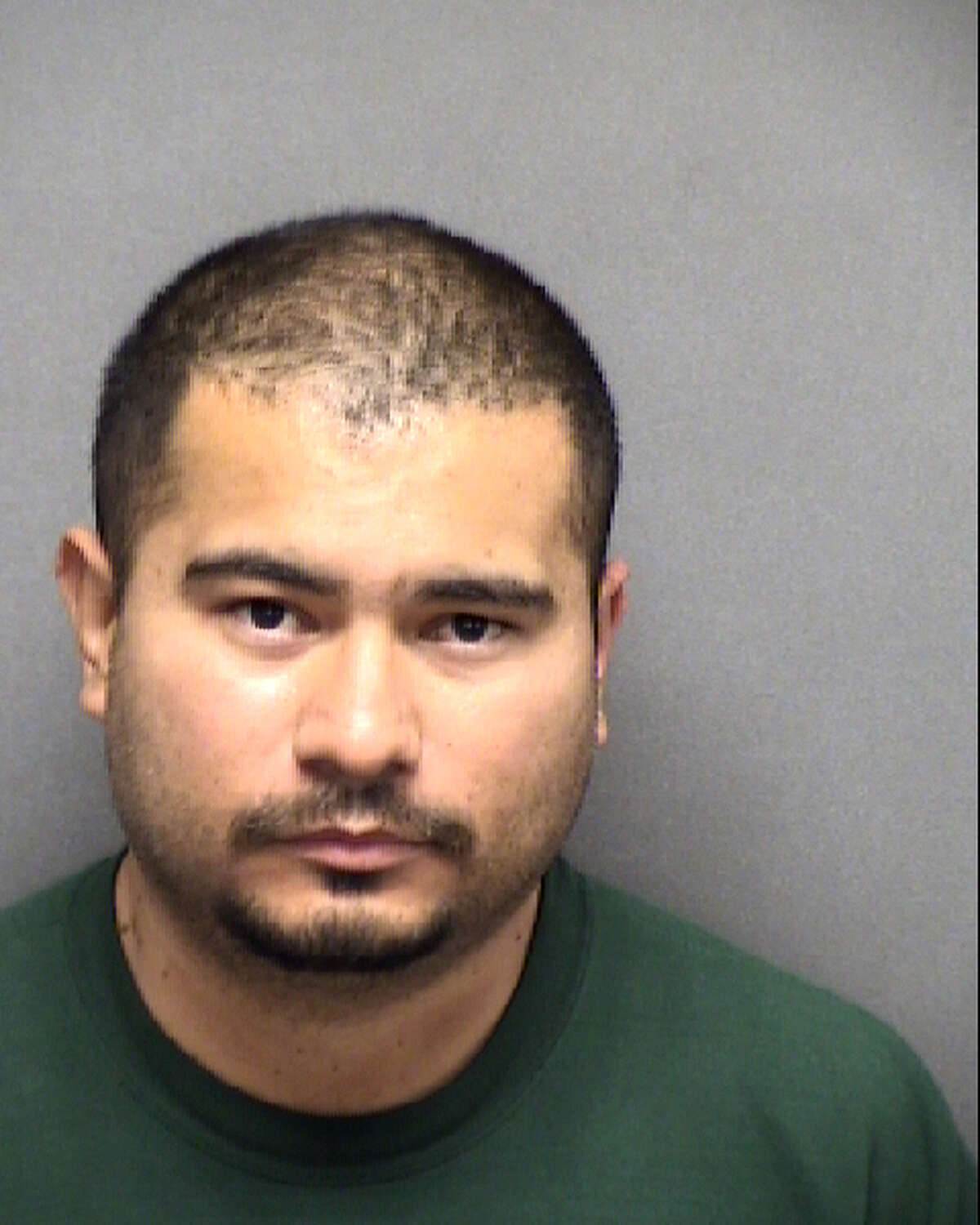 Reynaldo Uribe Jr., Reynaldo Uribe Jr., 35, was arrested for violation of an active protective order after San Antonio police officers found weapons during the execution of a search warrant.