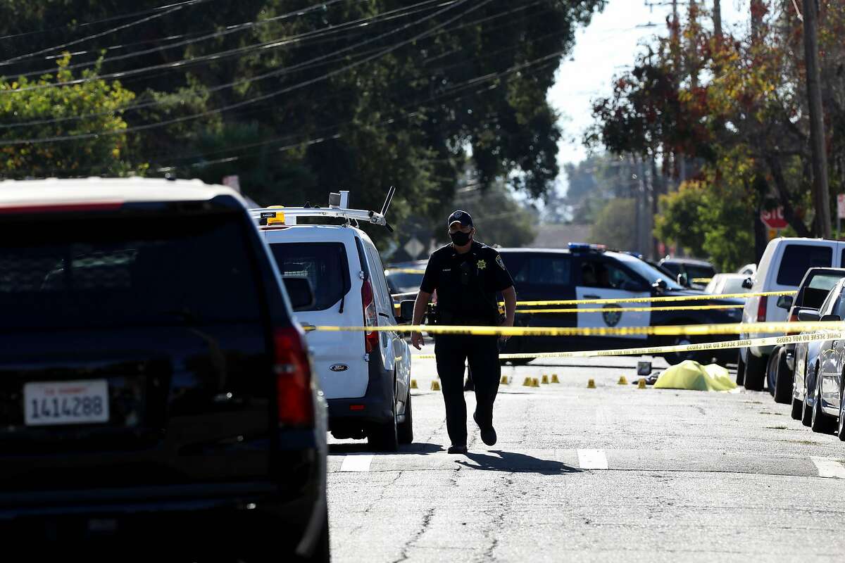 The Oakland Police Department investigates a fatal shooting in the 1900 block of 84th Ave. in Oakland, Calif., on Wednesday, October 14, 2020. One victim was a 19-year-old male who went by the nickname Lalo. The event left three shooting victims, with two fatalities. This incident marks the 77th and 78th homicides of the year in Oakland.