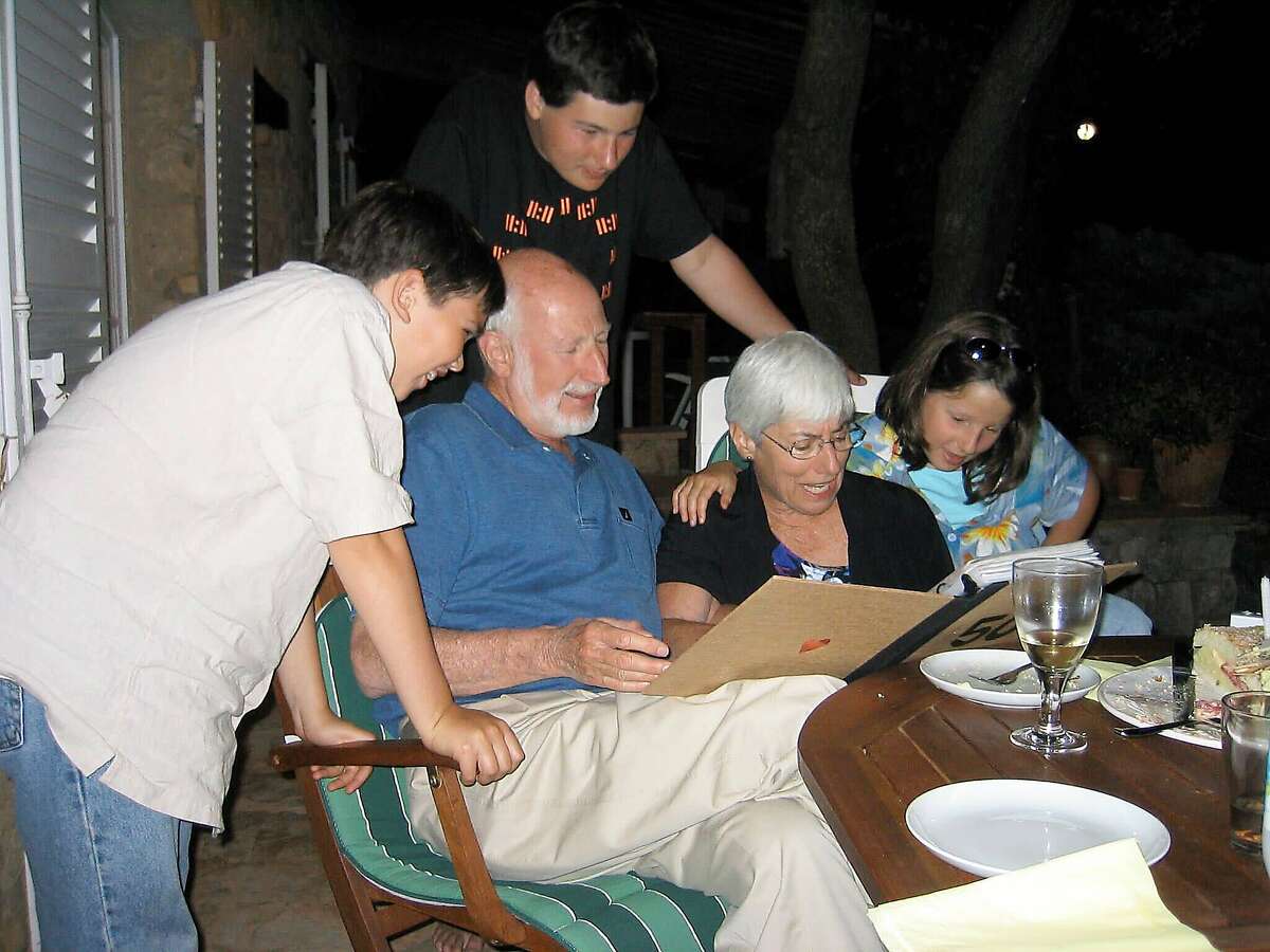 Norman Abramson (center) in a 2004 family photo.