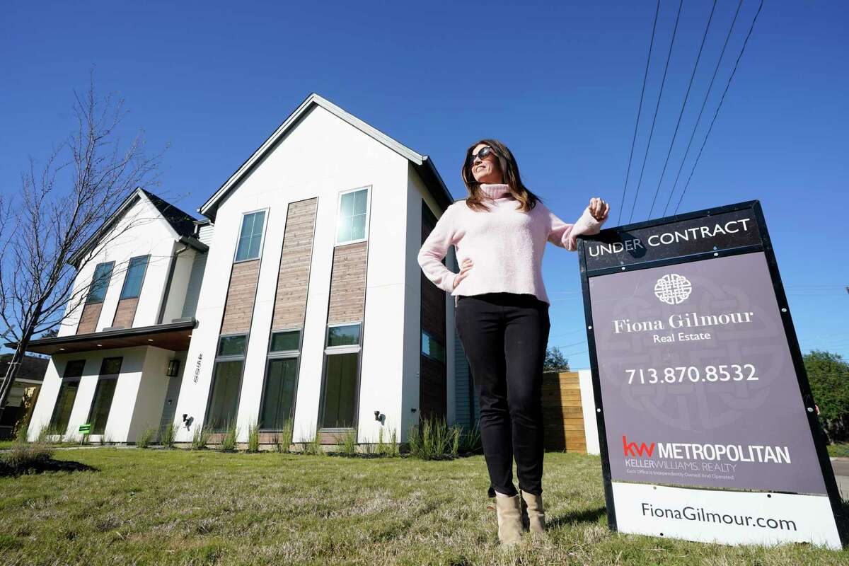 Fiona Gilmour, a Realtor with Keller Williams Realty Metropolitan, is shown outside one of her listings Wednesday, Dec. 9, 2020 in Bellaire. She takes precautions such as asking buyers about their travel and their exposure to COVID before showings.