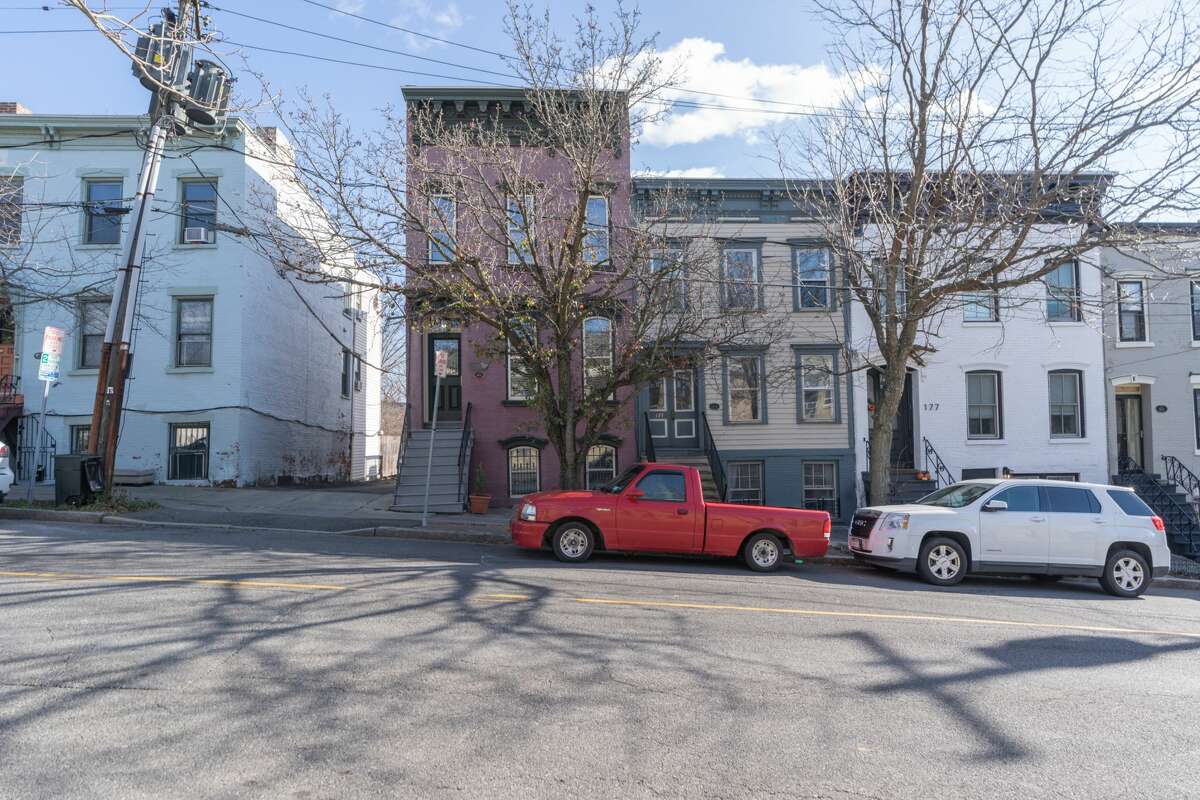 A downtown townhouse this week in Albany’s Mansion District. Built in 1871, the three-story home at 173 Eagle St., Albany, is divided into an owner’s unit and a garden-level apartment. Taxes: $5,130. List price: $219,000. Contact listing agent Julia Rosen of Berkshire Hathaway HomeServices Blake at 518-859-7725. https://realestate.timesunion.com/listings/173-Eagle-St-Albany-NY-12202-MLS-202033678/47445722