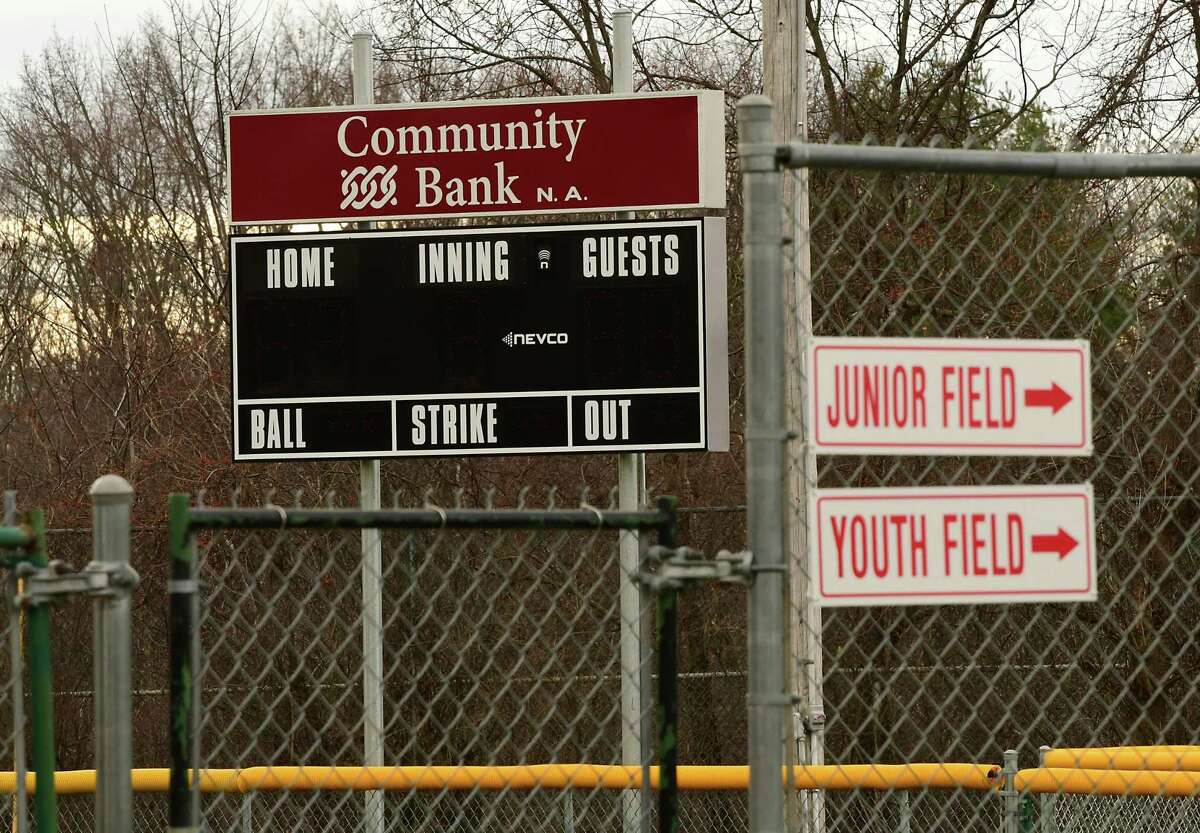A Community Bank sponsor sign is seen on top of the scoreboard of a baseball field at the Magee Park Tri -Village Little League on Thursday, Dec. 10, 2020 in Bethlehem, N.Y. (Lori Van Buren/Times Union)