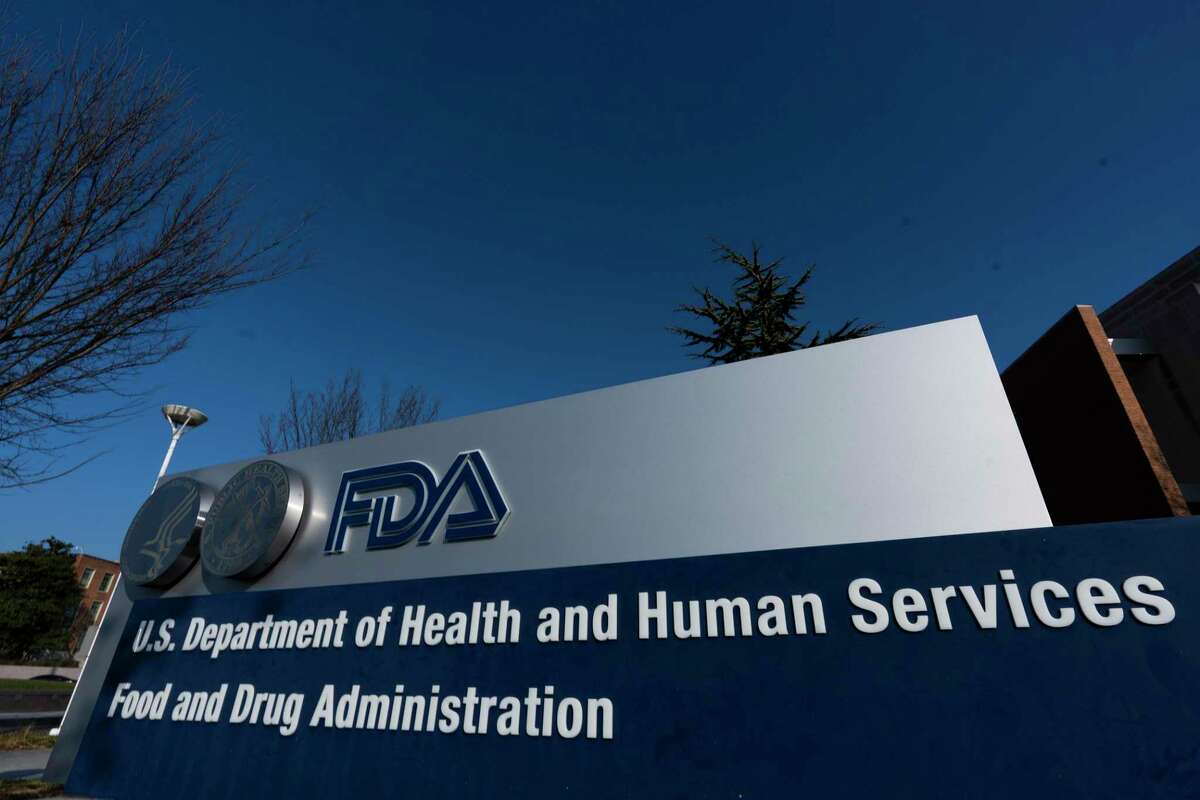 Food and Drug Administration building is shown Thursday, Dec. 10, 2020 in Silver Spring, Md. A U.S. government advisory panel convened on Thursday to decide whether to endorse mass use of Pfizer's COVID-19 vaccine to help conquer the outbreak that has killed close to 300,000 Americans. (AP Photo/Manuel Balce Ceneta)