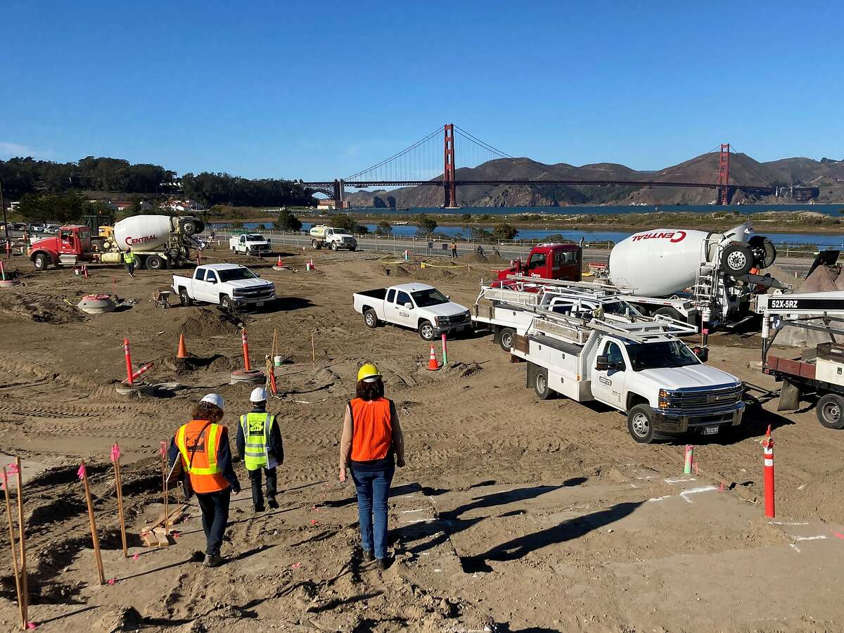 Construction workers at Tunnel Tops Park. When it opens next fall, the sculpted bluff will offer 14 acres of new parkland in San Francisco’s Presidio.