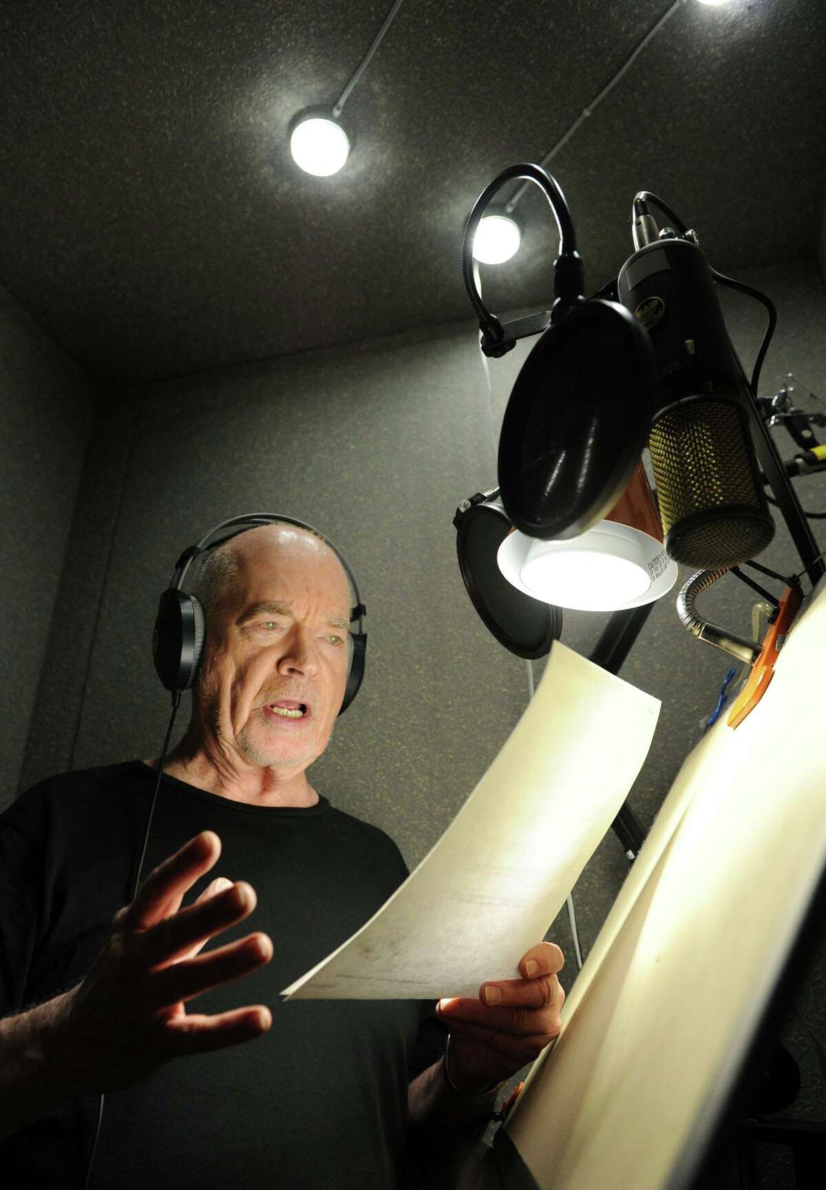 Don Morrow of Danbury is a local celebrity voice actor. He is pictured working in his recording booth at home Monday, Sept. 27, 2010.