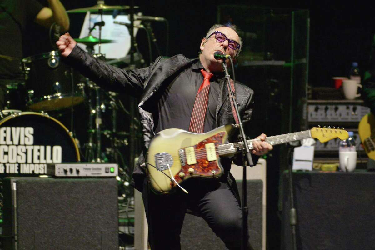 Elvis Costello performs live on stage with The Imposters, during their 'Just Trust' tour, at Hammersmith Apollo on March 13, 2020 in London, England. (