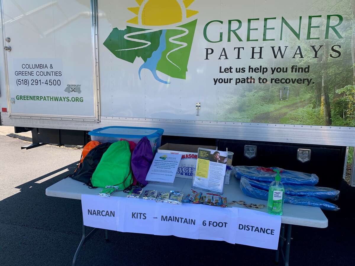 Greener Pathways’ mobile outreach table, offering Narcan kits and other drug user support during the COVID-19 pandemic, in Chatham, N.Y.