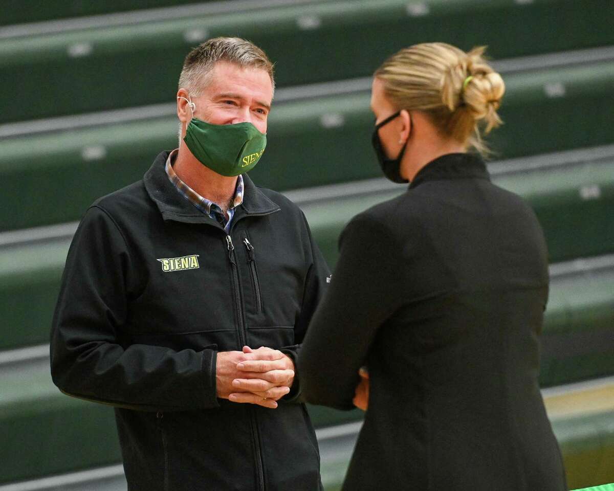 Siena College president Chris Gibson talks to womens basketball head coach Ali Jaques at Siena College in Loudonville, NY, on Friday, Dec. 11, 2020 (Jim Franco/special to the Times Union.)