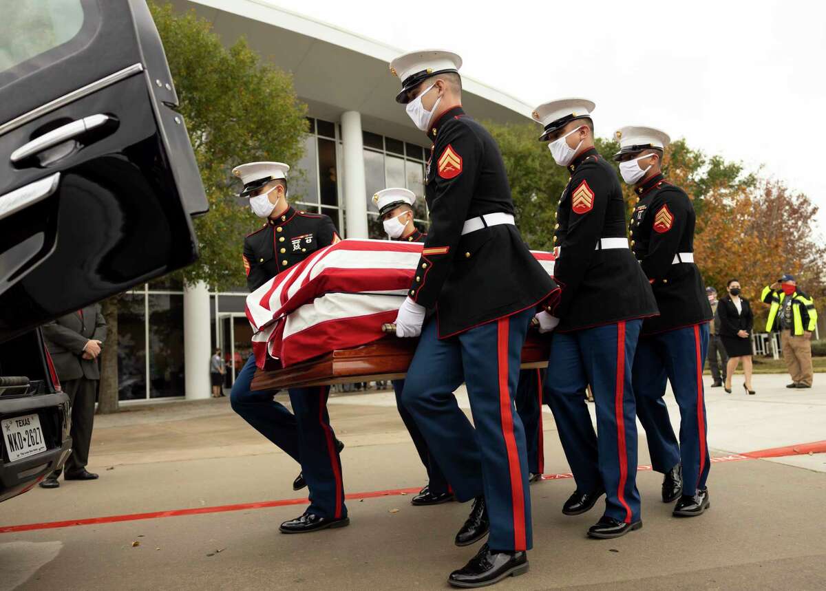 Marine Corps pallbearers place the casket of Sgt. Marty Gonzalez inside a hearse during a Celebration of Life service held at Champion Forest Baptist Church-Champions Campus, Friday, Dec. 12, 2020, in Houston. Gonzalez was a Marine from the Cypress area who died suddenly Nov. 28.