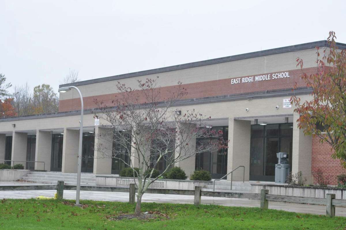 East Ridge Middle School in Ridgefield sent "multiple" students and staff home Friday after a person tested positive for COVID-19 who had been in school all week.