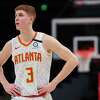 ATLANTA, GA - FEBRUARY 3: Kevin Huerter #3 of the Atlanta Hawks looks on during the fourth quarter of a game against the Boston Celtics at State Farm Arena on February 3, 2020 in Atlanta, Georgia. NOTE TO USER: User expressly acknowledges and agrees that, by downloading and or using this photograph, User is consenting to the terms and conditions of the Getty Images License Agreement.