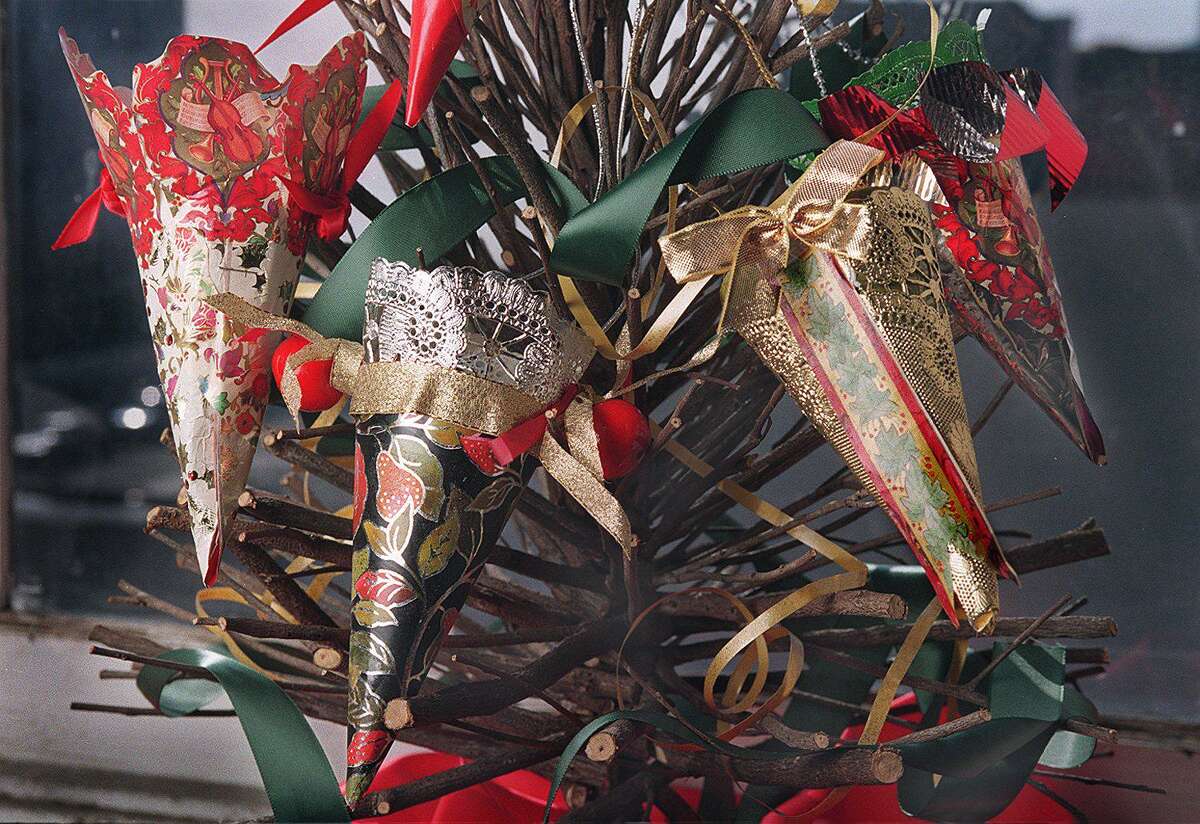 Pictured are ornaments made from wrapping paper. The Recording Secretary of the Ridgefield Democratic Town Committee, (DTC), writes an opinion in this column about what she feels voters should do.