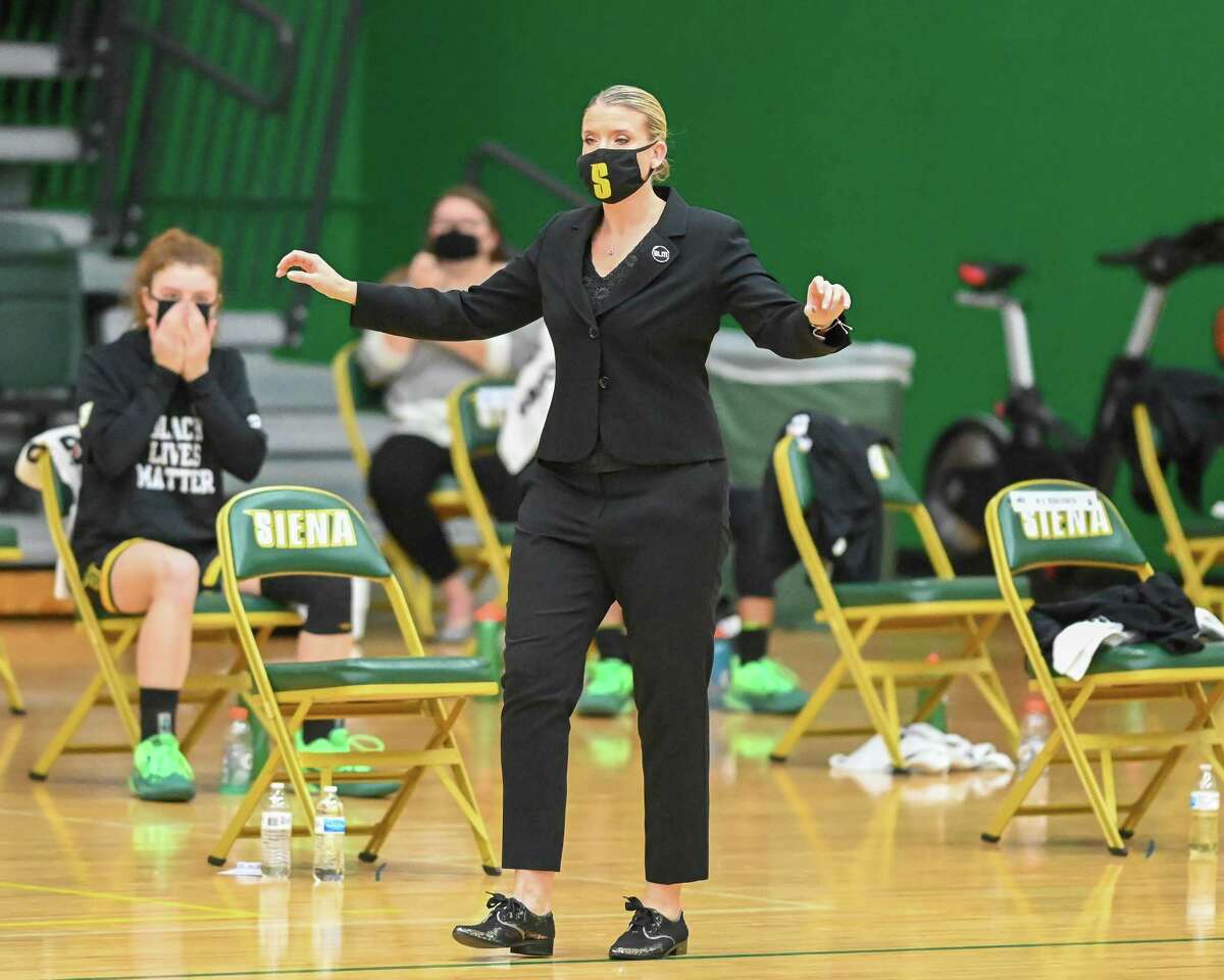 Siena College coach Ali Jaques directs her team from in front of a socially distanced bench during a Metro Atlantic Athletic Conference game against Fairfield University at Siena College in Loudonville, NY, on Saturday, Dec. 12, 2020 (Jim Franco/special to the Times Union.)