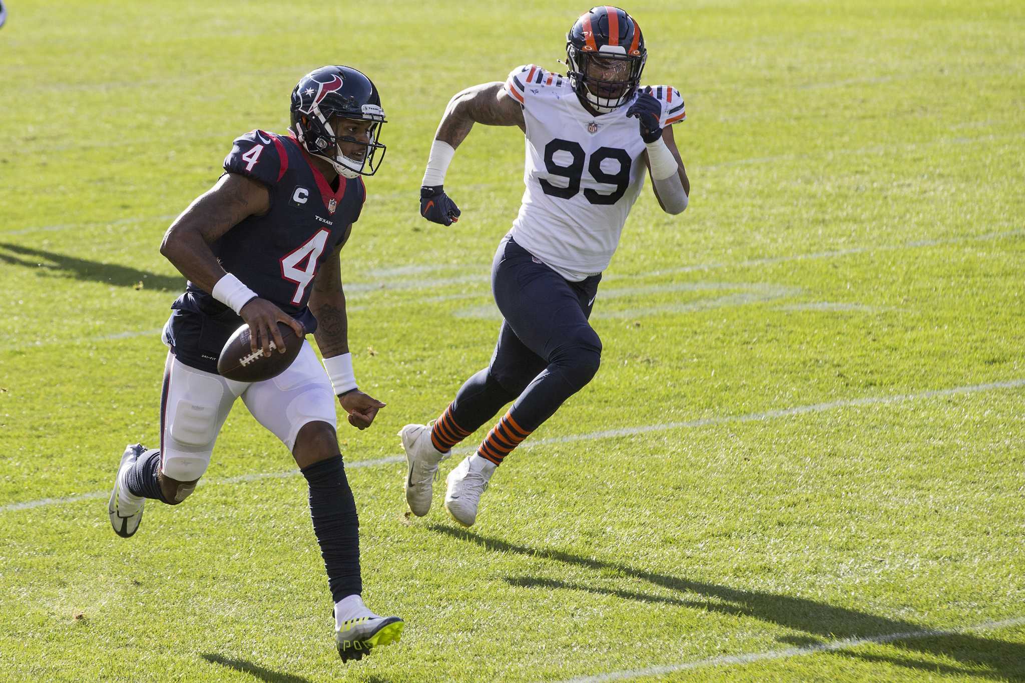 Chicago Bears defensive end Trevis Gipson (99) runs off the field