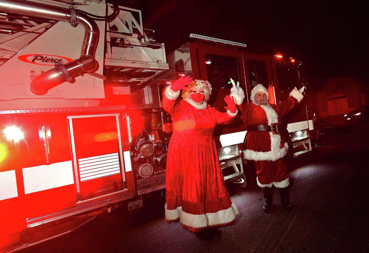 Celebrate Shelton holds its seventh annual community tree lighting Friday, December 11, 2020, at the Rotary Pavilion at Veteran's Memorial Park in Shelton, Conn. In addition to the tree lighting and the visit from Santa and Mrs. Claus, the event featured an ice sculpture demonstration by Ice Matters; a fire dance performance with Sarotonin Performance Arts; and a holiday dance party. The community tree lighting was sponsored by the city, Center Stage Theatre, Apple Rehab, Jones Family Farm, Echo Hose Hook & Ladder Co. 1 and Valley Community Foundation.