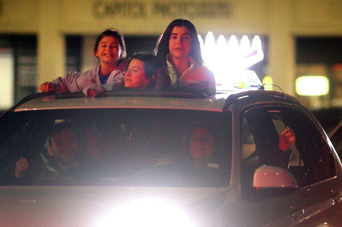 Members of Chabad of Fairfield hold a Car Menorah Parade along Post Road in Fairfield, Conn., on Thursday Dec. 10, 2020. A Menorah lighting to celebrate Hanukkah came at the end of the parade that started at Chabad of Fairfield, joined Chabad of Shelton and Chabad of Westport members midway along the route along Post Road in Fairfield.