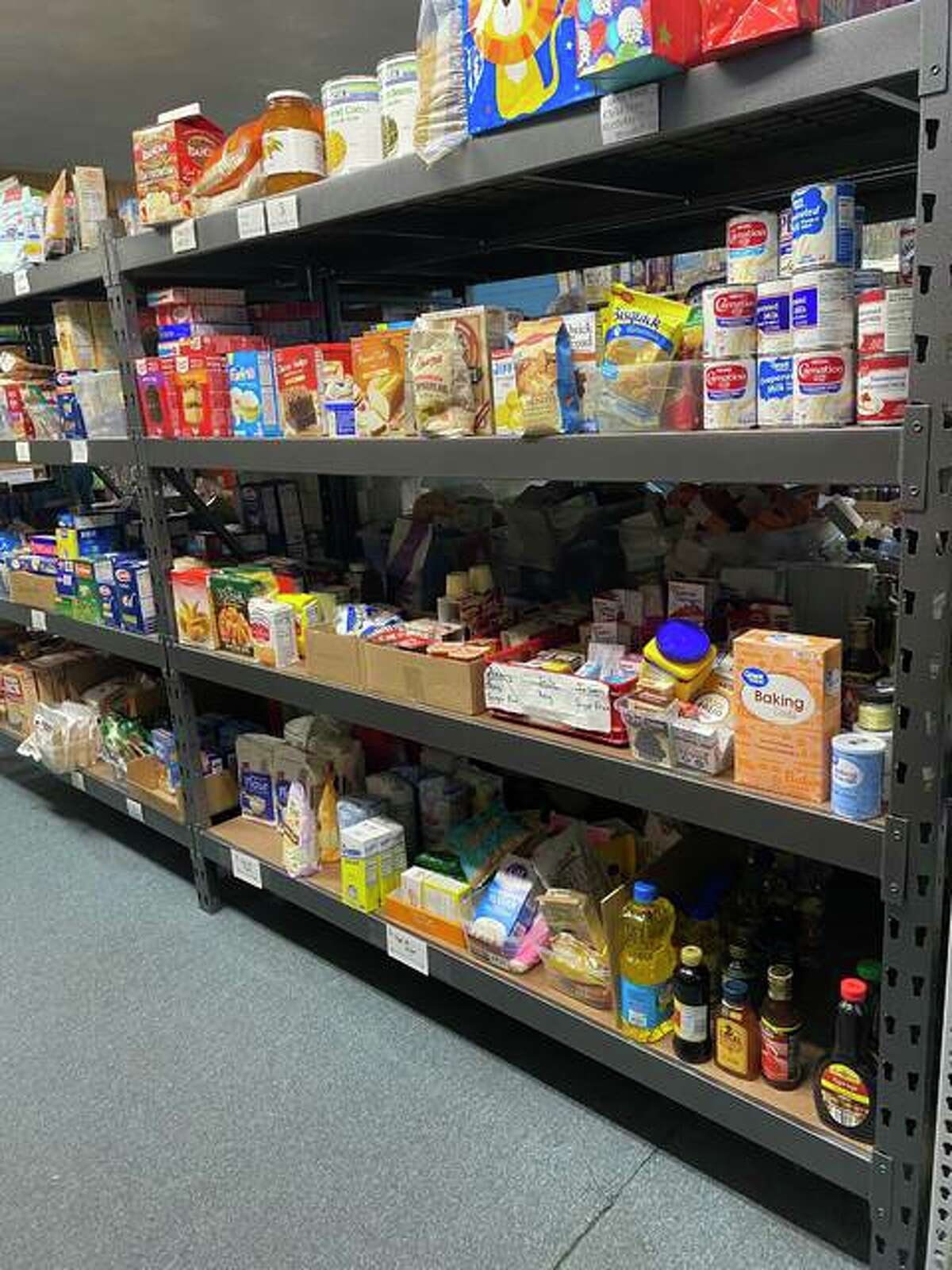 The shelves at Glen-Ed Pantry are currently full of food and other items, but Jane Ahasay, director of development for the the pantry, wants to make sure the shelves will remain full beyond the holidays.