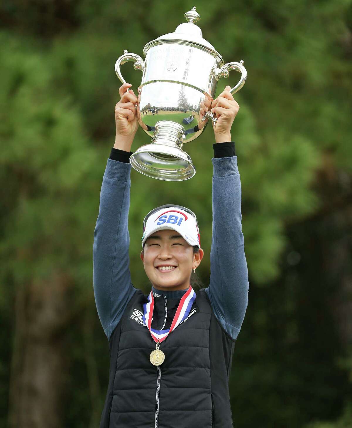 A Lim Kim of Korea holds up the Harton S. Semple trophy after winning the 75th Annual U.S. Women's Open at Champions Golf Club in Houston on Monday, Dec. 14, 2020.