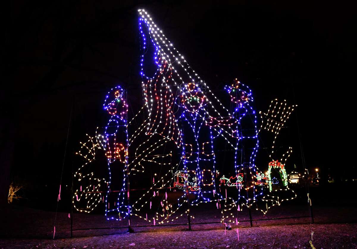 Displays are lit up for families to enjoy at the Capital Holiday Lights in Washington Park on Thursday, Dec. 10, 2020 in Albany, N.Y. (Lori Van Buren/Times Union)