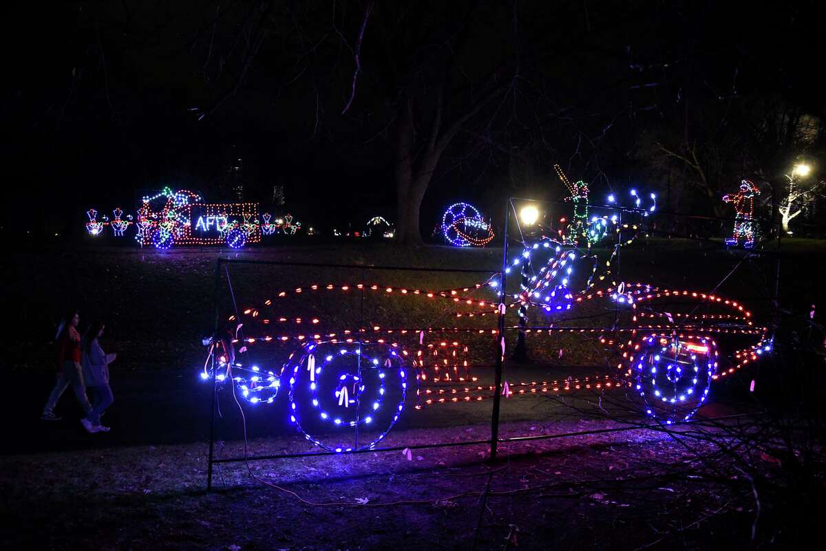 Displays are lit up for families to enjoy at the Capital Holiday Lights in Washington Park on Thursday, Dec. 10, 2020 in Albany, N.Y. 