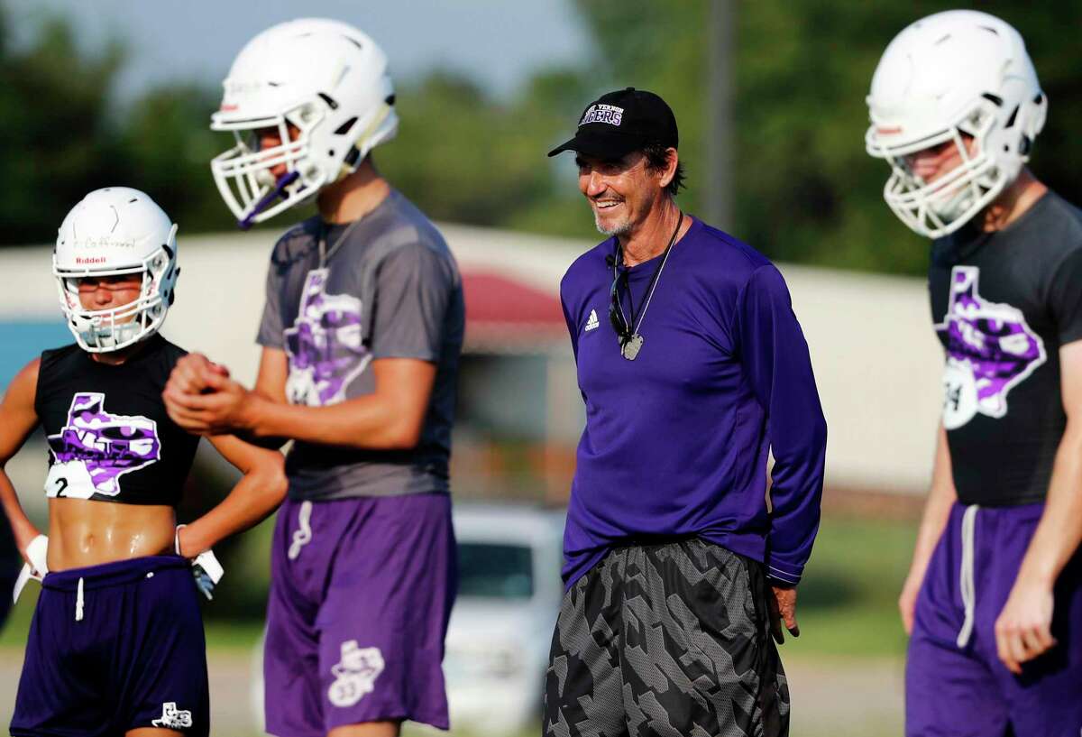 Coach Art Briles runs a practice at Mount Vernon High School, Monday, Aug. 5, 2019, in Mount Vernon, Texas. Briles was back at his roots Monday, coaching a high school football team in Texas after a season in Italy and more than three years after the two-time Big 12 champion coach was fired by Baylor in the wake of a sexual assault scandal. (AP Photo/Tony Gutierrez)