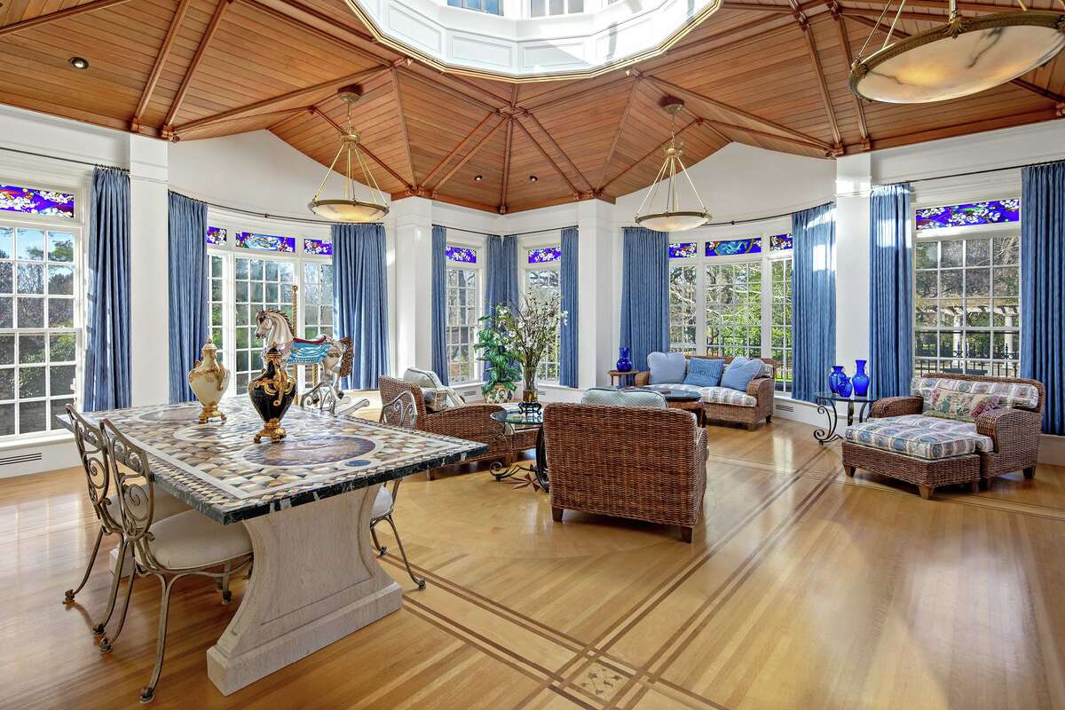 English conversatory with glass dome and stained glass transoms at 1211 Old Academy Road, Fairfield. Inside the 7,635-square-foot, 13-room cream-colored colonial main house - which was built in 1948- there is a custom home movie theater
