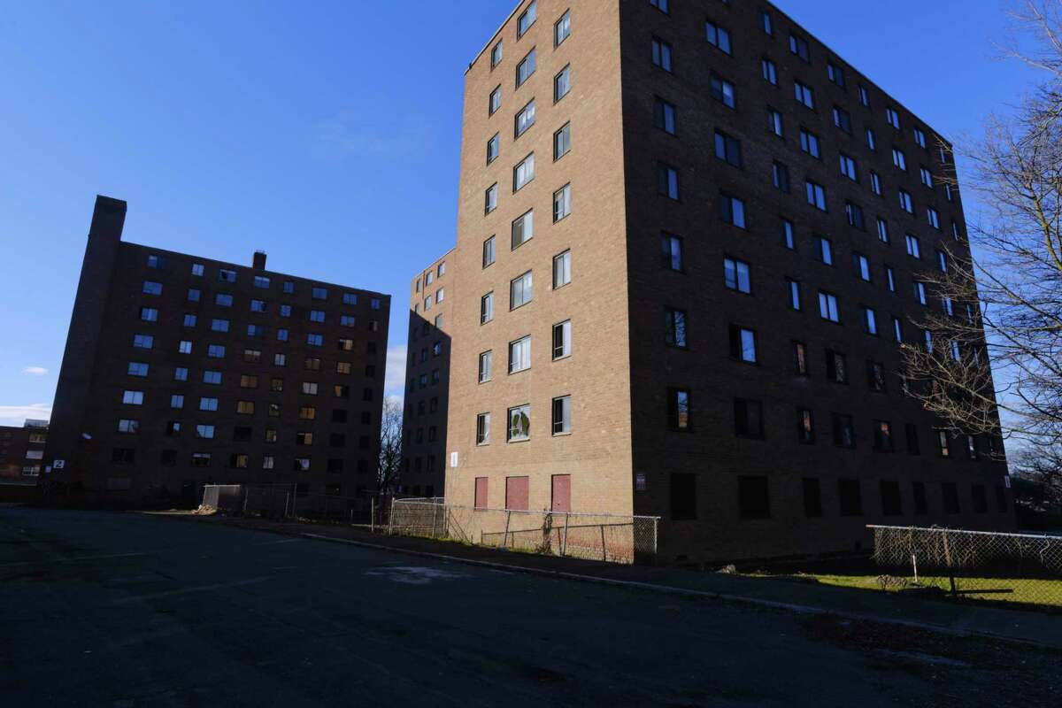 A view of the Taylor Apartments on Tuesday, Dec. 15, 2020, in Troy, N.Y. On the right is building #1 and on the left is building #2. The two towers will be demolished this summer. (Paul Buckowski/Times Union)