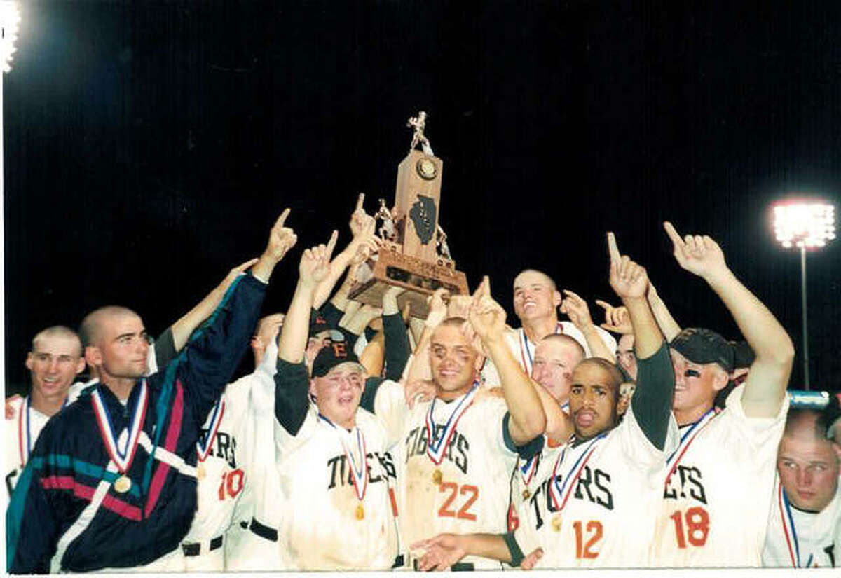 Matt Evers, No. 22, middle, and his Edwardsville teammates celebrate after the Tigers won the Class AA state championship in 1998.