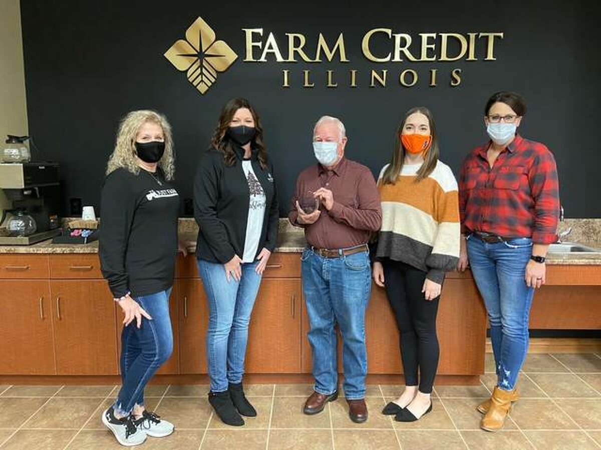 Farm Credit Illinois of Jerseyville recently received the 2020 Community Partner Award. Pictured from left are Judi Neese, Member Service Specialist; Hollie Nixon, Regional Manager; Jack Stork, Extension Council Chairman; Jessica Jaffry, 4-H & Youth Development Program Coordinator; and Jackie Goode, Loan Process Specialist.
